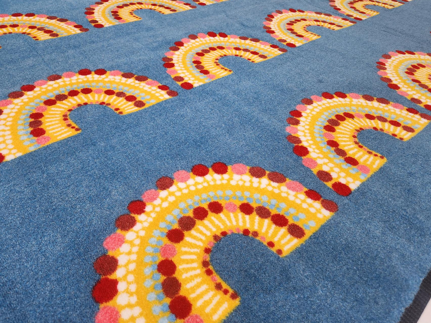 Beautiful rainbow Australian Indigenous classroom mat. Kirsten Gray