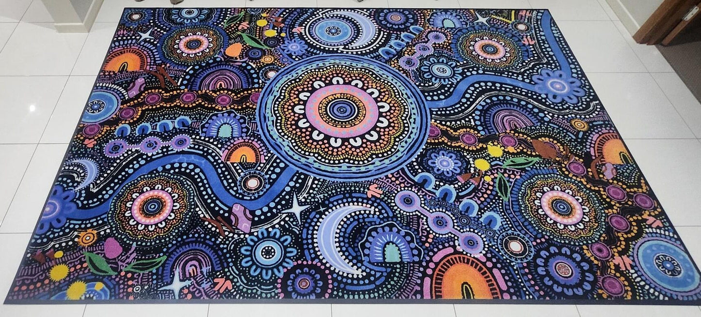Ngulawaa classroom rug by Kirsten Gray, 2m x 3m, with vibrant Indigenous design, non-slip backing and non-trip edges. Front on view.