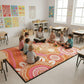 Children sitting on Australian Indigenous Mat in classroom