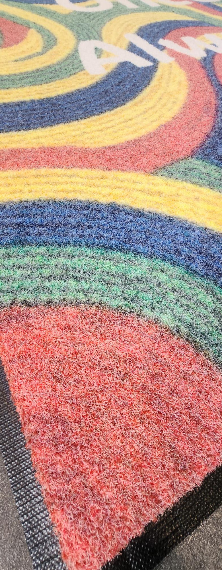 Side view colourful custom welcome outdoor mat
