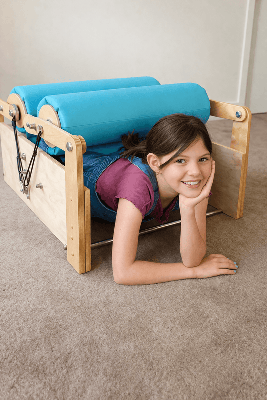 happy child in therapy roller