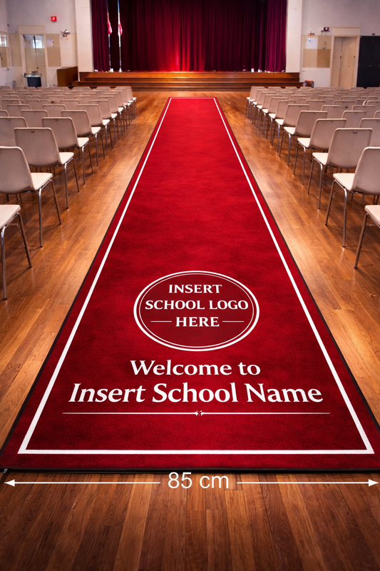 red carpet in school hall school name and crest